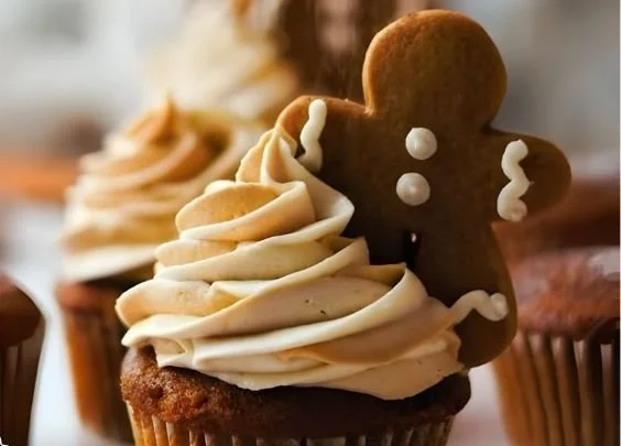 Delicious gingerbread cupcakes decorated with frosting and spices