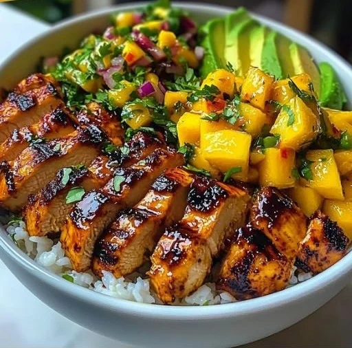 Grilled Maple Sriracha Chicken bites on a platter with garnishes