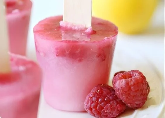 Refreshing Raspberry Lemonade Popsicles on a sunny day