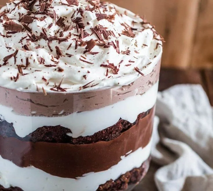 Delicious Brownie Trifle dessert with layers of brownies and cream