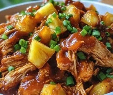 Crockpot Pineapple BBQ Chicken served with sides on a plate