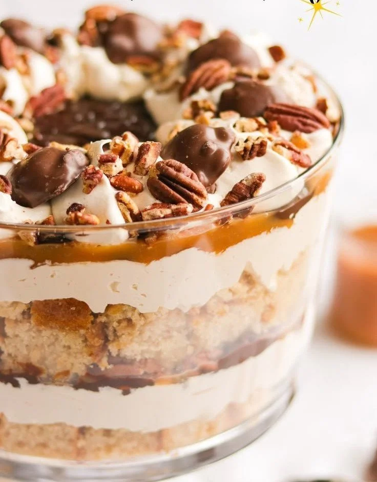 Turtle trifle dessert with layers of chocolate, caramel, and pecans.