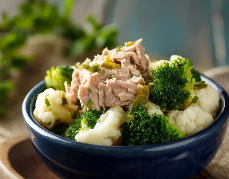 Creamy tuna broccoli casserole in a baking dish topped with breadcrumbs
