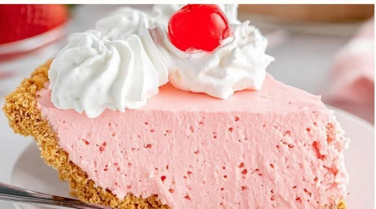 Delicious Strawberry Cool Whip Pie topped with fresh strawberries