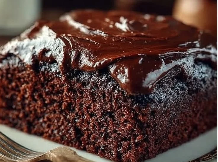 Decadent Chocolate Craving Cake topped with rich chocolate frosting