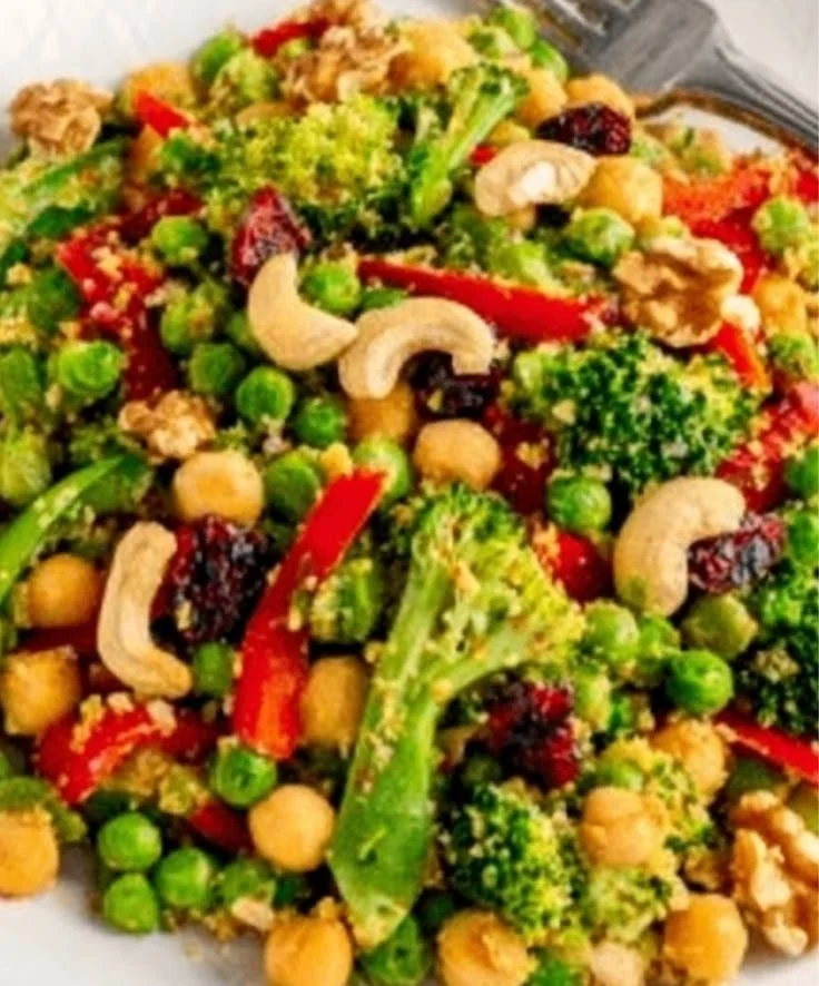 Bowl of Curry Chickpea Quinoa Salad with vibrant vegetables and spices