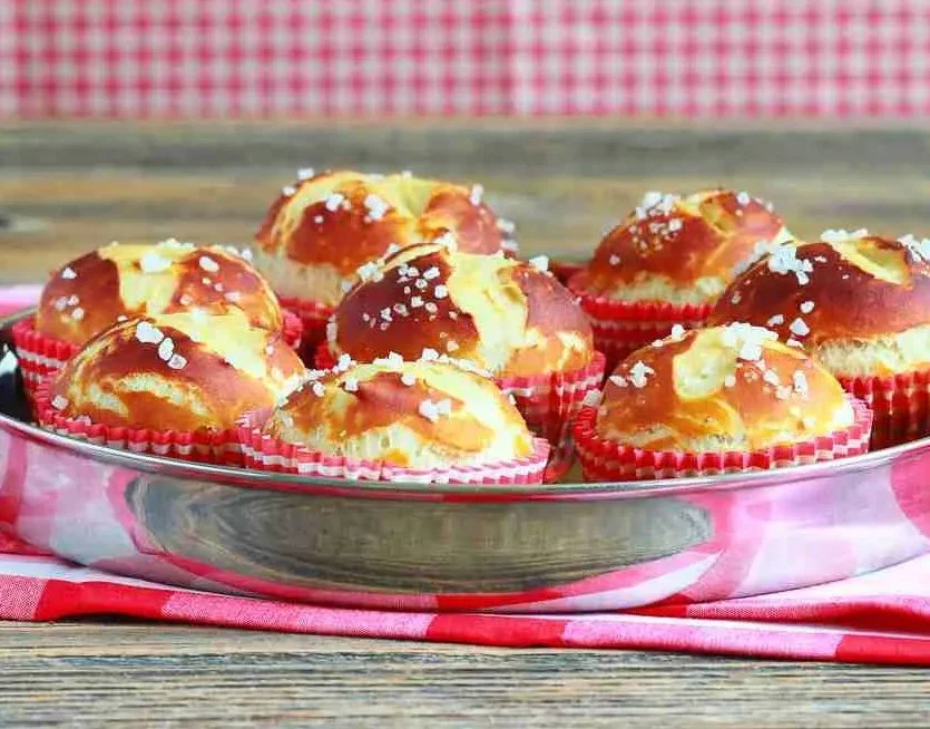 Oktoberfest Pretzel Muffins served on a platter with toppings