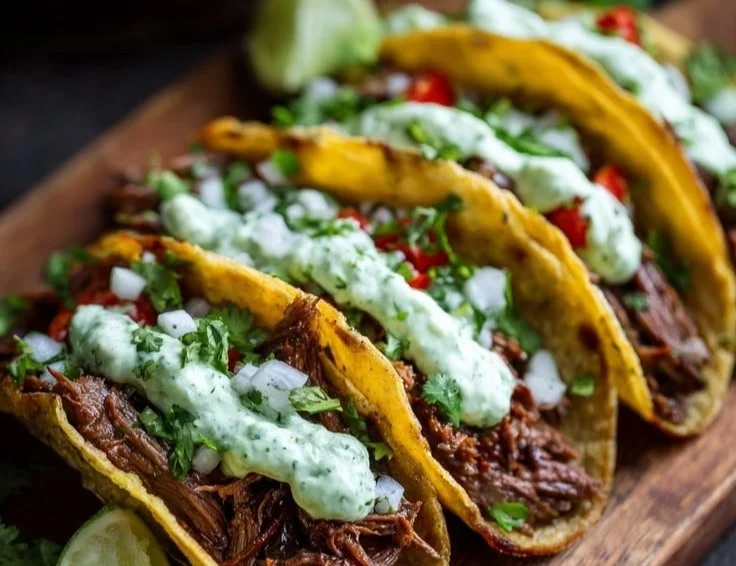 Crockpot Beef Skirt Tacos with Cilantro Lime Garlic Sauce