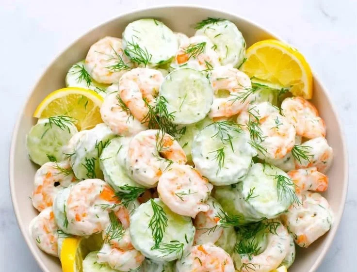 A fresh Cucumber Shrimp Salad with vibrant vegetables and succulent shrimp.