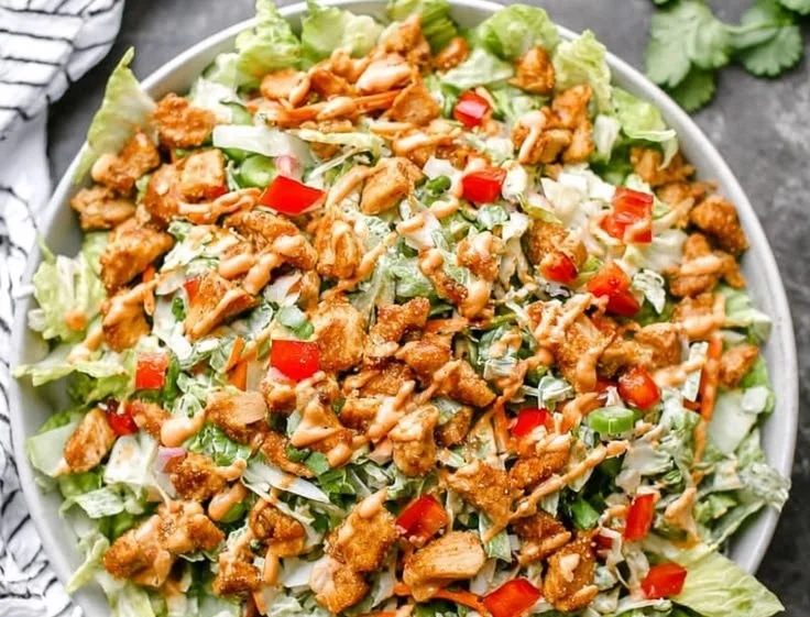 Delicious Thai Peanut Chicken Salad with crunchy slaw and vibrant vegetables