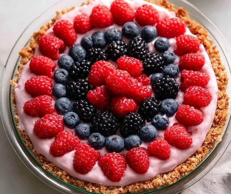 Delicious Berry Fruit Pizza with Oatmeal Cookie Crust topped with fresh berries