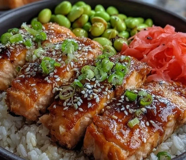 Delicious sheet pan teriyaki salmon bowls with vibrant vegetables and rice