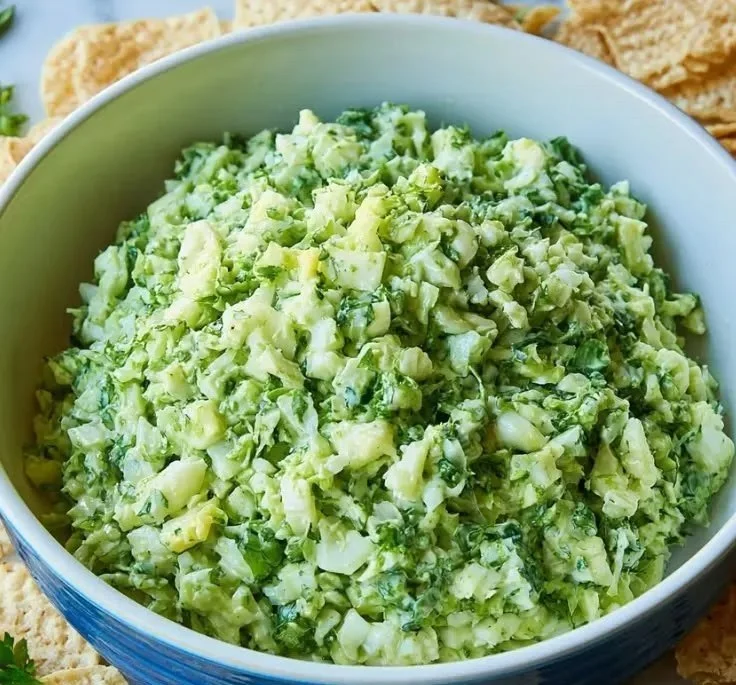 Fresh Green Goddess Salad with greens, herbs, and creamy dressing