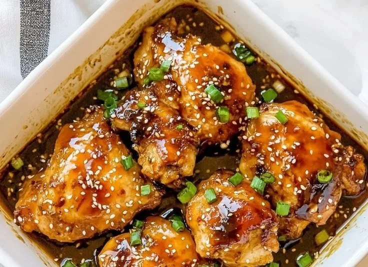 Delicious plate of miso chicken garnished with green onions and sesame seeds