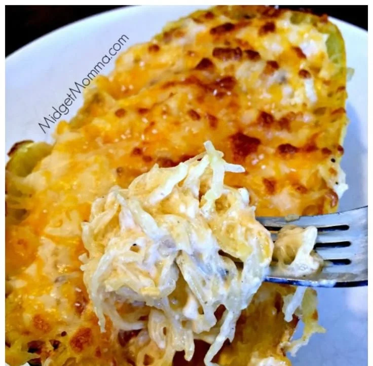 Baked Spaghetti Squash Au Gratin topped with melted cheese and herbs
