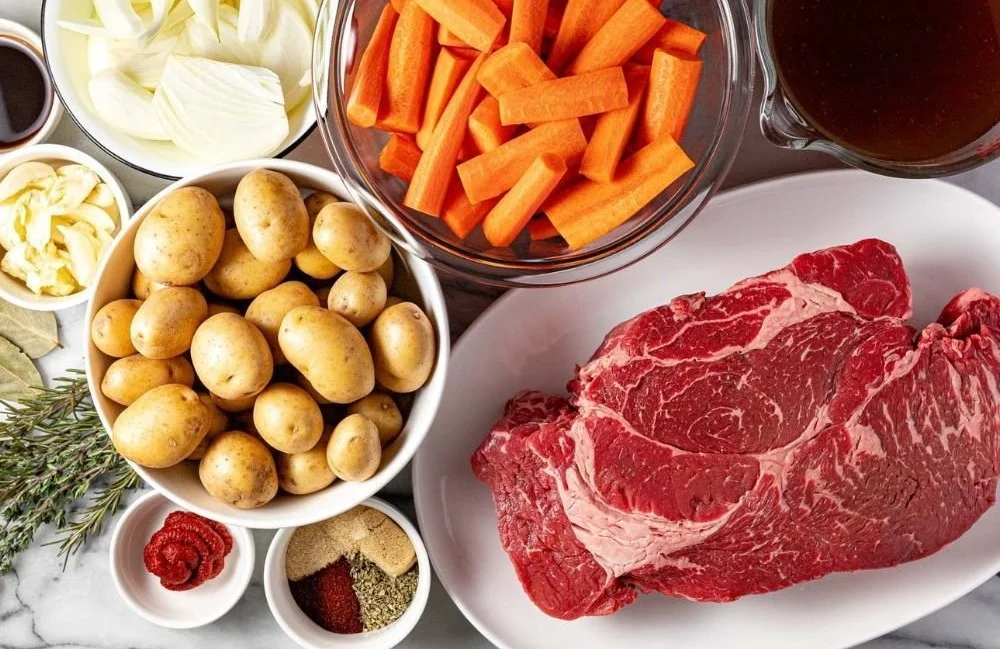Delicious easy crock pot pot roast served with gravy