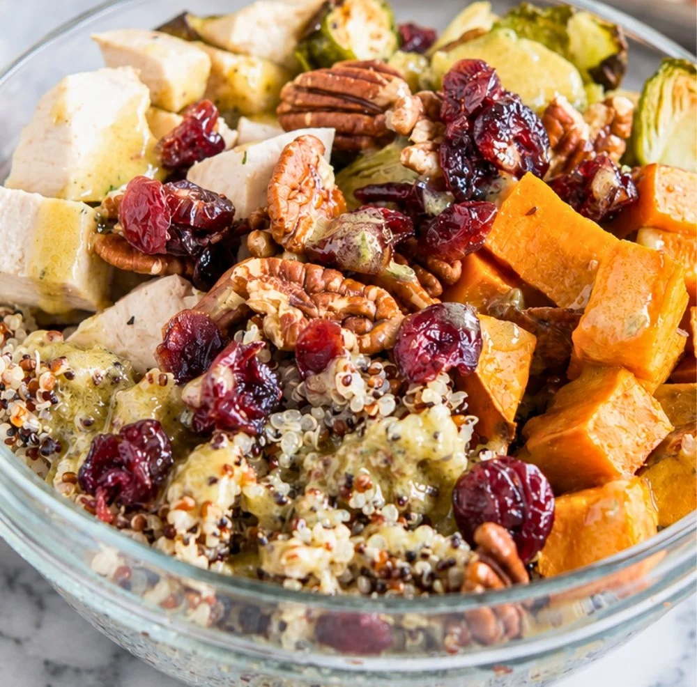 Harvest chicken quinoa bowls, a colorful high-protein meal prep option.