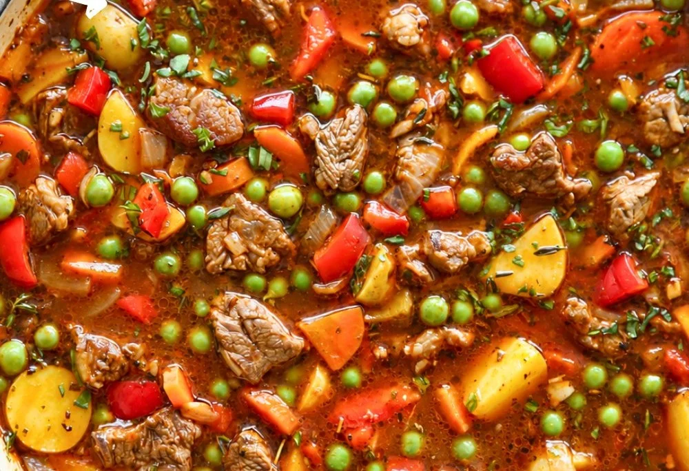 One-pot vegetable beef soup with tender beef, potatoes, and assorted vegetables.