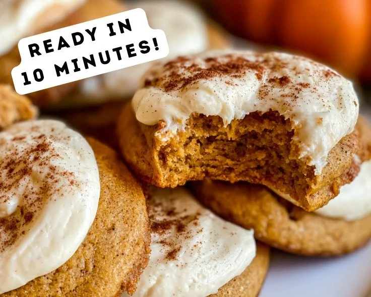 Delicious pumpkin cookies with cream cheese frosting on a plate
