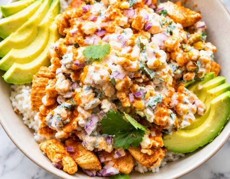 Easy Street Corn Chicken Rice Bowls in a vibrant bowl, showcasing healthy ingredients.