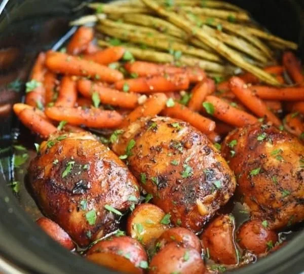 Slow Cooker Honey Garlic Chicken with mixed vegetables served in a bowl