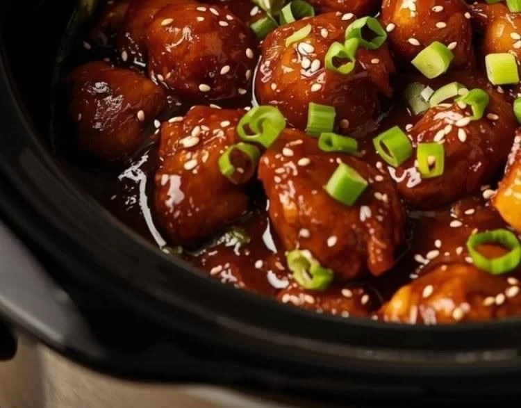 Slow cooker General Tso's chicken dish with vibrant vegetables